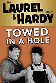 Watch Full Movie :Towed in a Hole (1932)